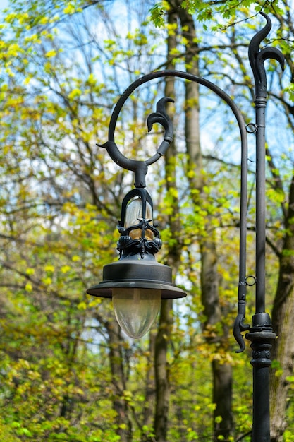 Old street lantern lighting on facade of building Twilight on city street building illumination Retro lantern lighting warm light glow Street lights illumination and vintage lantern