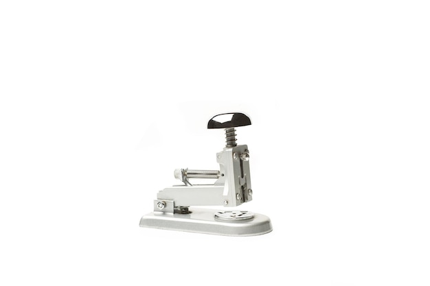 An old style stapler isolated on a white background with copy space