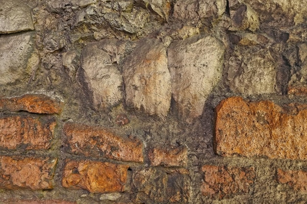 The old texture of the wall the background of the building the brick