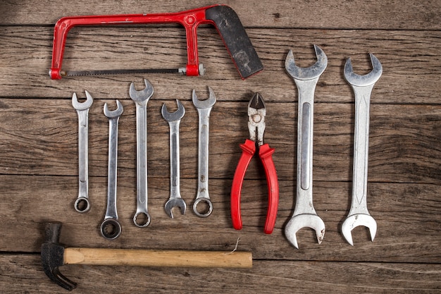 old tools on wooden background