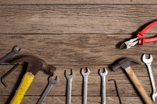 old tools on wooden background