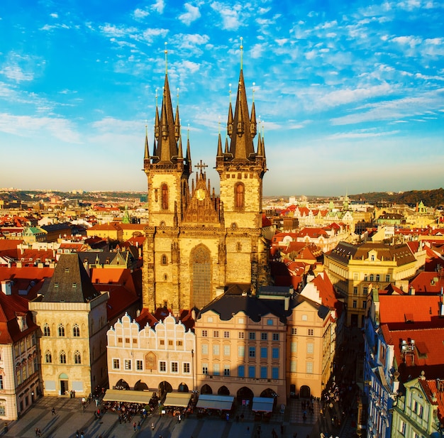 Old Town Square with Church of Our Lady before Tyn in eastern european Czech capital Prague - panoramic sunny view from Town Hall