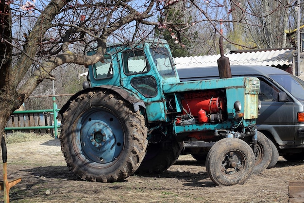 Old tractor at the russian village