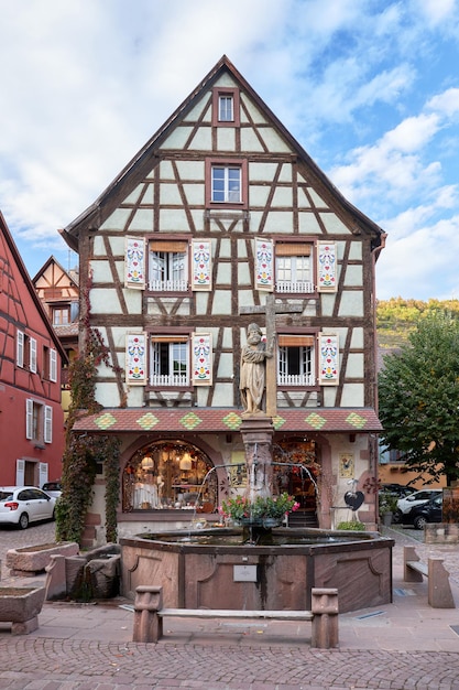 Old typical house decorated of the village of eguisheim in the area of Alsace France