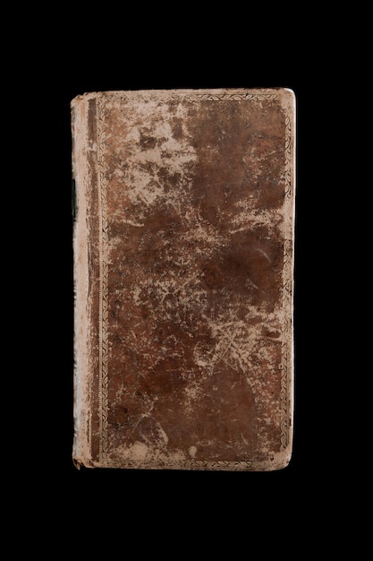 Old vintage book isolated on black background