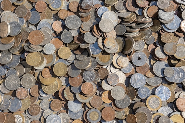 Old vintage coins background for sale for tourists in the Ukrainian market on the street in Kyiv, Ukraine. Close up, top view