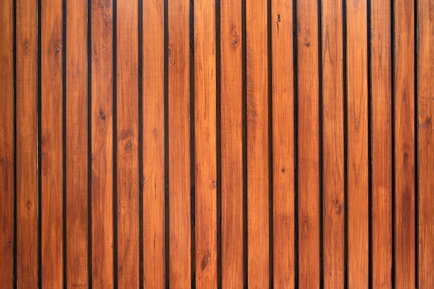 Old vintage red brown wood lath wall cladding