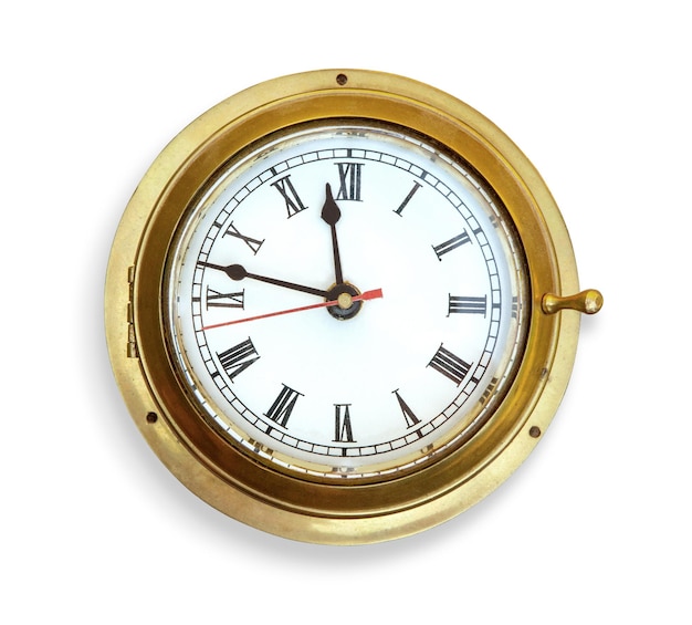 Old vintage ship's clock. Isolated on white with clipping path