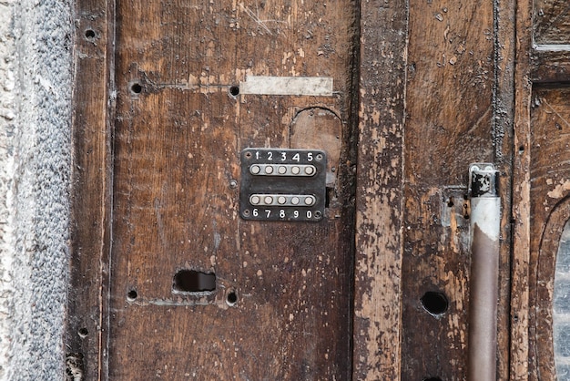 Old vintage wooden doors close up with lock