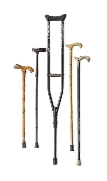 old walking crutches on white background