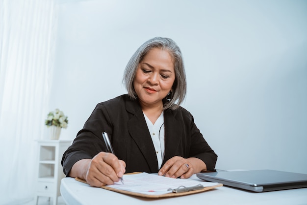 Old woman beautiful mature asian woman doing business