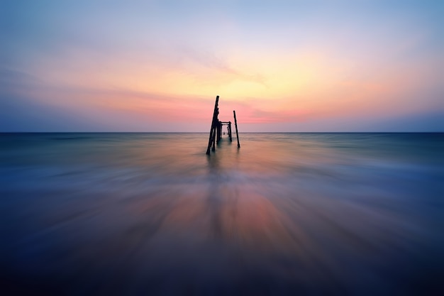 Old wood bridge in the sea