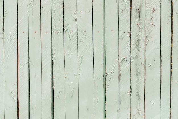 Old wooden background of boards with cracked and peeling paint Wooden texture