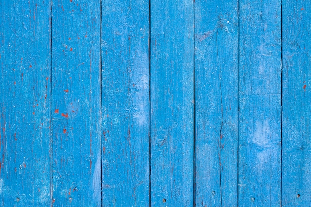 Old wooden board background with cracked paint