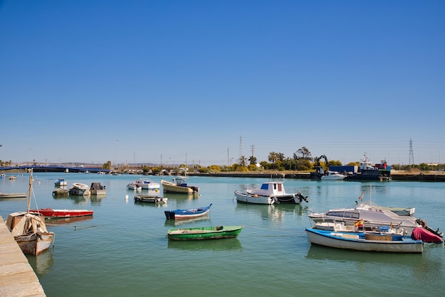 Old wooden boats anchored in a river