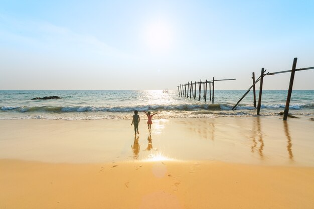 Old wooden bridge at Pilai Beach, Phang Nga Province