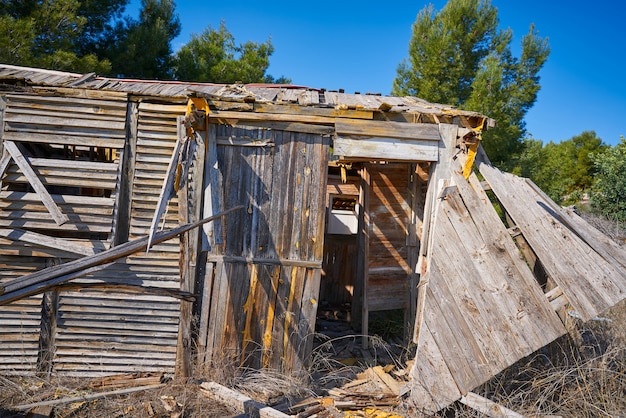 Old wooden cabin house destroyed by hurricane