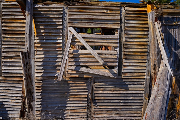 Old wooden cabin house destroyed by hurricane