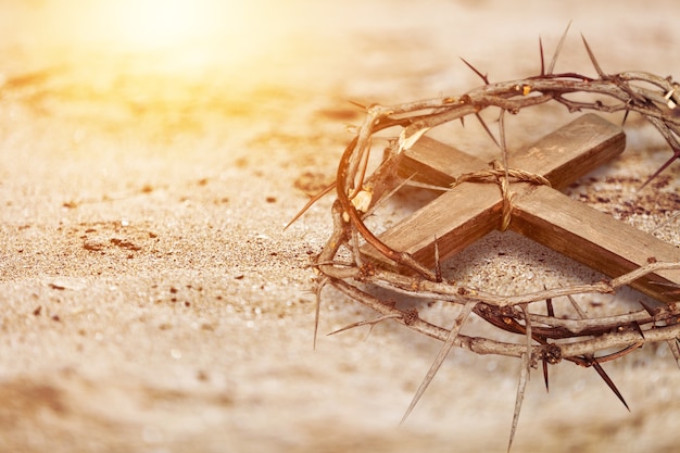 Old wooden crown of thorns on the ground. Christian Easter holiday.