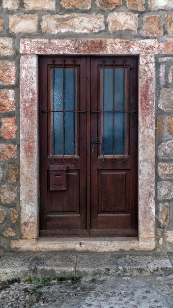 Old wooden door in the old town in Dubrovnik