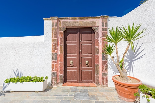 Old wooden door Traditional Greece property entrance stone gate