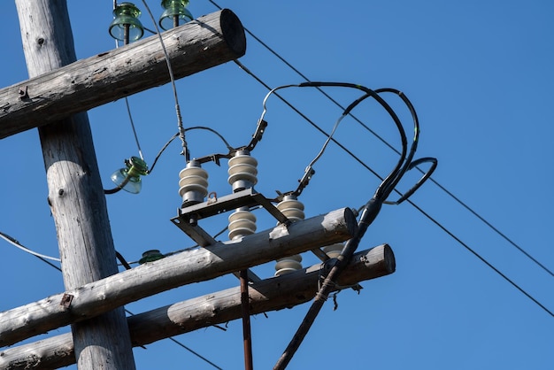 Old wooden high voltage electric transmission tower