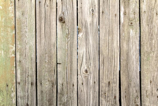 Old wooden planks in a fence as an abstract background