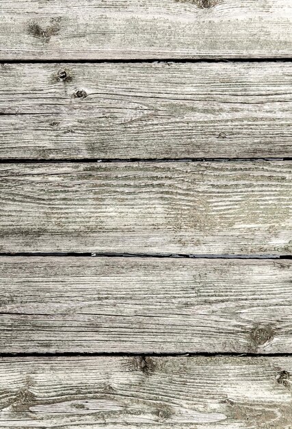 Old wooden planks in a fence as an abstract background