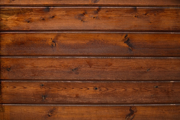 Old wooden vintage texture, surface with horizontal cracks, scuffs and dark spots.