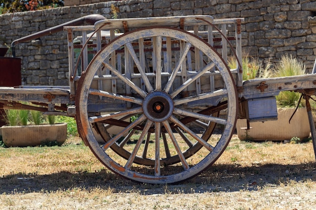 Old wooden wagon wheel handcraft in perfect condition vintage public transport