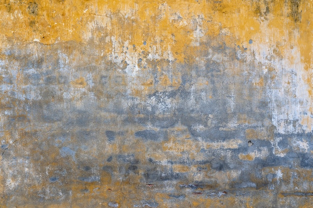 Old yellow painted wall texture