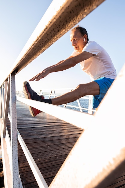 Older man taking care of his health with sport