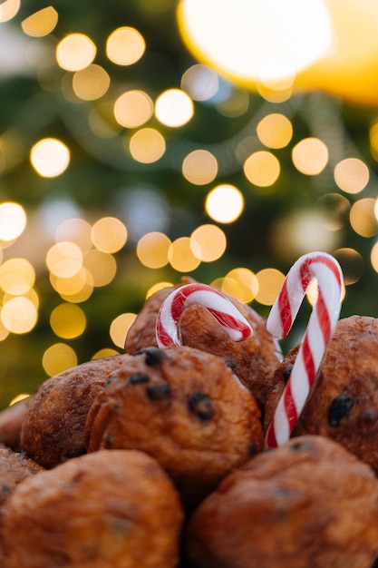 Oliebollen traditional dutch pastry for new years eve with sparkles oil dumpling or fritter with