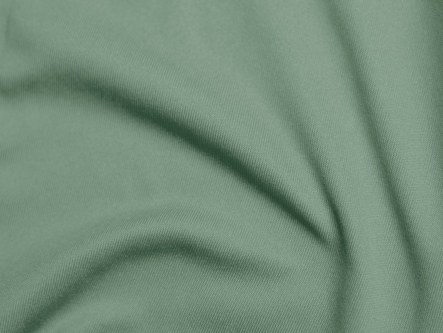 Olive green color velvet fabric texture used as background lightxDOlive green fabric background of soft and smooth textile material There is space for text