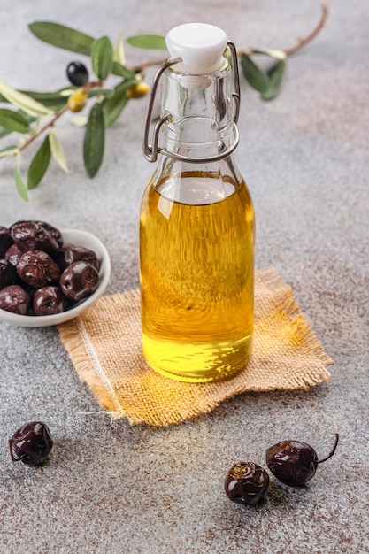 Olive oil in glass bottle