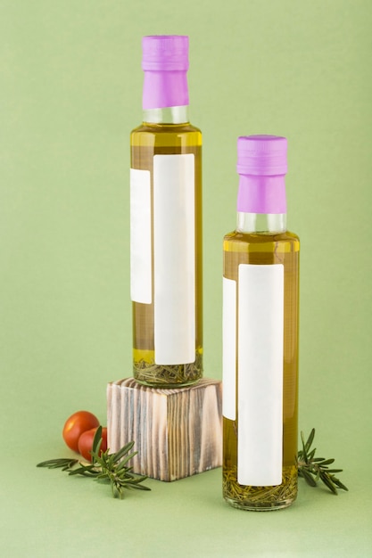 Olive oil with rosemary spices in a glass bottle