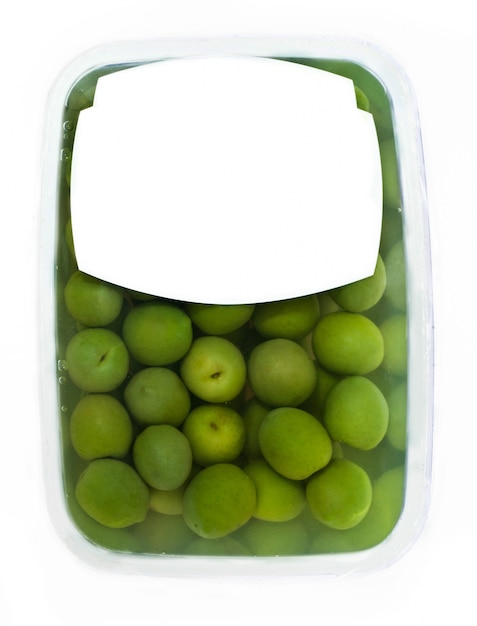 Olives in plastic box surface