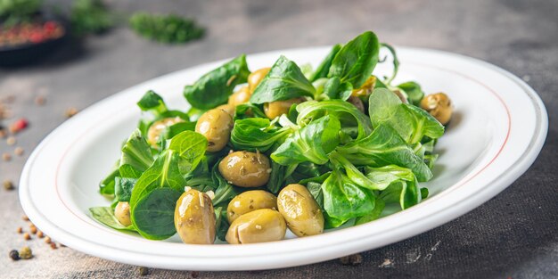 olives salad green leaf lettuce, mache corn lettuce fresh healthy meal food snack diet on the table