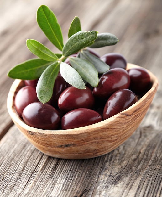 Olives in wooden bowl