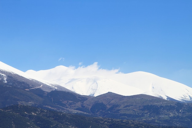 Olympus Mountain covered by snow in Greece