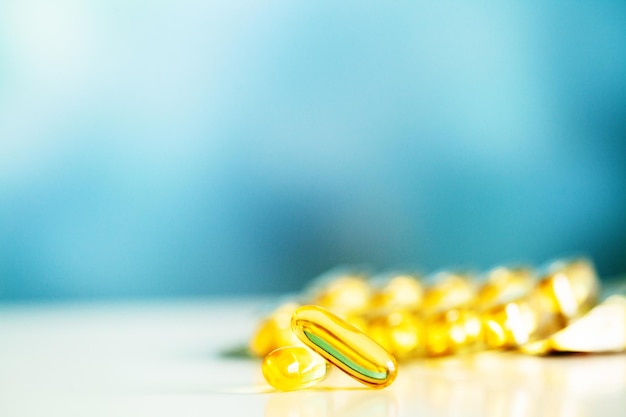 Omega 3 fish oil yellow soft gel capsules.