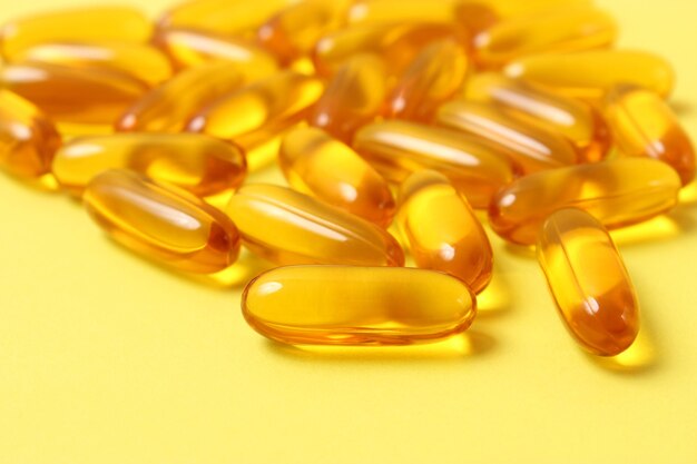 Omega capsules on a colored background fish oil healthy supplements