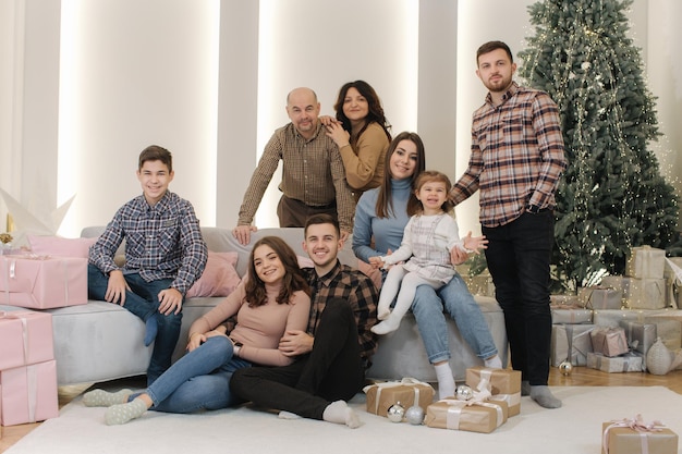 One big stylish family at christmas eve portrait of noel large family gathering young grandparents