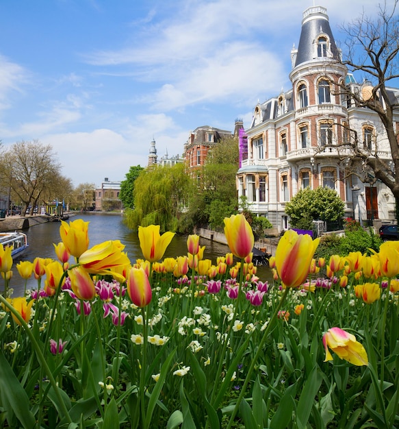 One of canals in Amsterdam old town at spring day, Netherlands