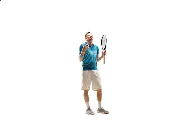 One caucasian man playing tennis player isolated on white wall