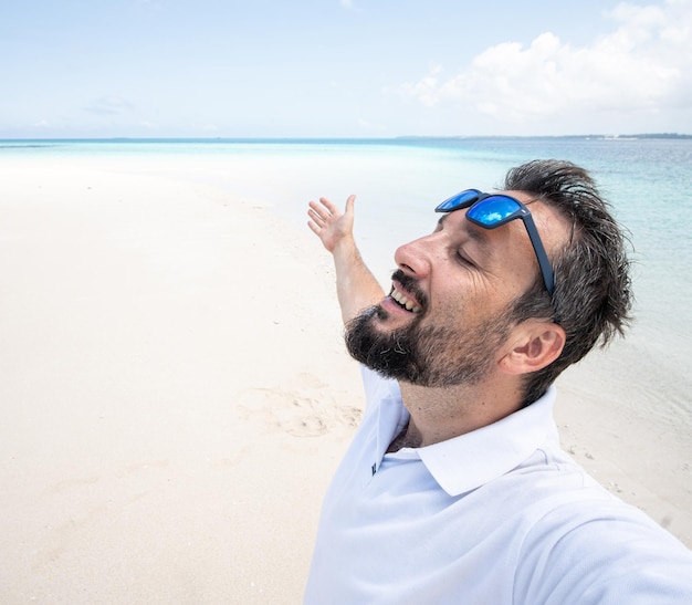 One man is enjoying beautiful tropical beach