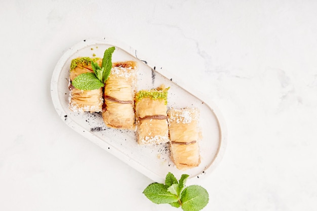 One of the most beautiful desserts of Turkish cuisine baklava with pistachio Traditional turkish dessert baklava