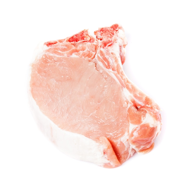 One raw pork loin slice isolated on white background