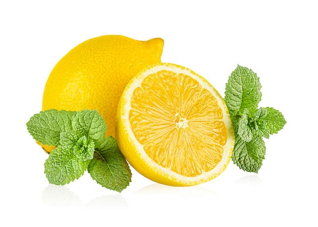 One whole lemon, one half lemon and mint leaves on white isolated