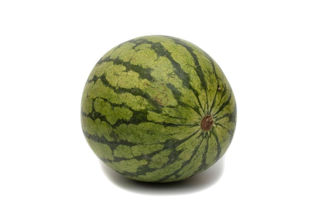 One whole watermelon, isolated on white background. It is originally from Africa .